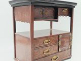 a small wooden cabinet with two drawers and a shelf