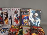 a lot of comic books that are on the table
