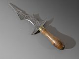 a knife that is laying on a table