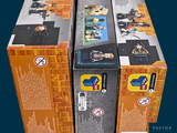 two boxes of legos that are sitting on top of each other