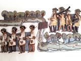 a group of figurines that are on the wall