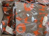 a cardboard box filled with orange and gray clothing