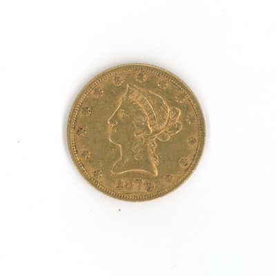 a gold coin with a picture of a woman on it