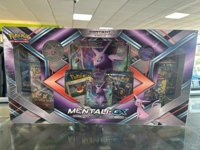 gros plan d'une boîte de cartes pokemon sur une table