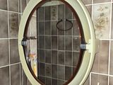 a bathroom with a sink and a mirror on the wall