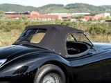 a black sports car parked on the side of the road