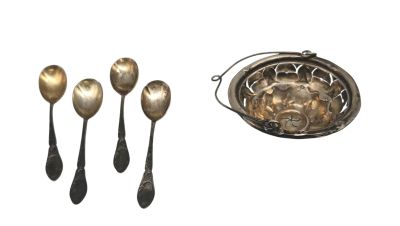five spoons and a bowl on the table