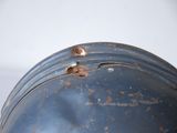a close up of a helmet with holes in it