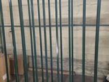 a picture of a room that has a bunch of metal bars in it