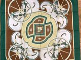 brown and green square scarf with white and green design on it