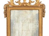an image of a mirror with a gold frame on a white background