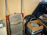 an image of a room with a cart and a chair