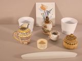 a picture of a collection of pottery items on a table