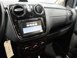 the dashboard of a car with a digital display in the center