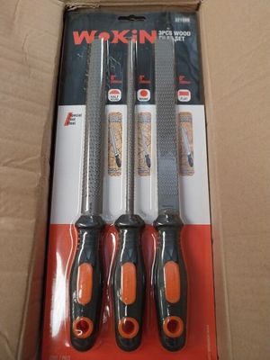 three different types of tools are in a box on a table