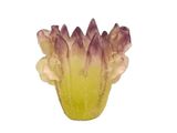 a yellow vase with a purple flower inside of it