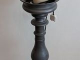 a candle that is sitting on top of a table