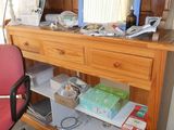 a desk with a chair and a computer on it