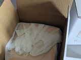 a box with a cloth inside of it on a table