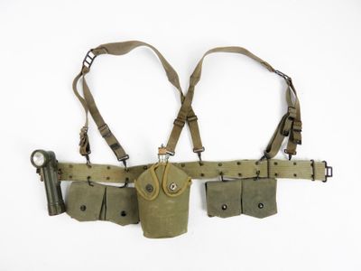 a belt that has two holsters attached to it