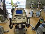 an image of a gym room with tread machines