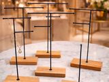 a table with a bunch of wooden stands on top of it