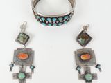 a close up of a bracelet and a bracelet with turquoise and orange stones