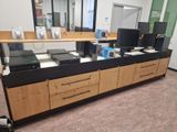 an image of a computer lab with a lot of desk space