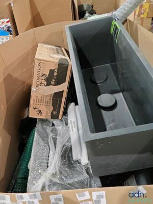 a box full of items that are sitting on the floor