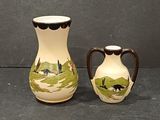 two vases sitting next to each other on a table