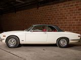 an image of a white car parked in a garage