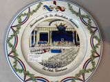 an image of a plate with a picture of a building on it