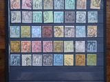 a black folder with a bunch of different stamps on it