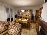 a living room with a couch and a table in it