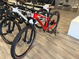 many bikes that are sitting on the floor in the store