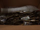 a cardboard box filled with lots of different types of tools