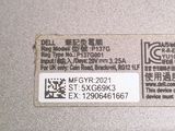 the label on the back of a laptop computer is clearly visible