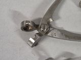 a pair of scissors and a pair of scissors on a table