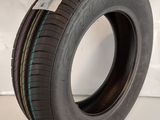 a close up of a tire on a white surface