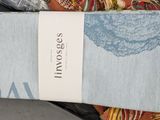 an image of a tie with a tag on it