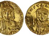 une pièce d'or sur laquelle figure le portrait de Jésus