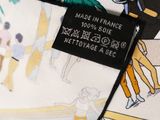 a close up of a tie with a label on it
