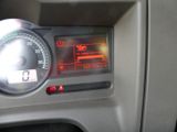 a close up of a car dashboard with a speedometer