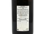 a bottle of wine that is sitting on a table
