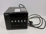 an image of a hard drive with a power cord plugged into it