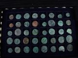 a box with a lot of coins inside of it