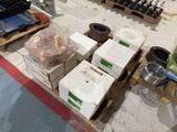 many boxes of different types of equipment on the floor
