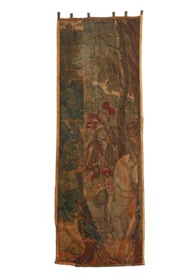 an image of a tapestry hanging on a wall with a man riding a horse