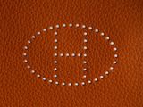 an image of a close up of a brown bag with white dots on it