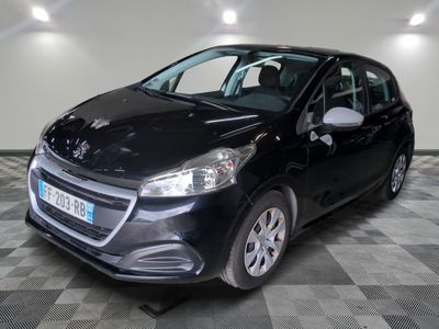 a picture of a black car parked in a garage